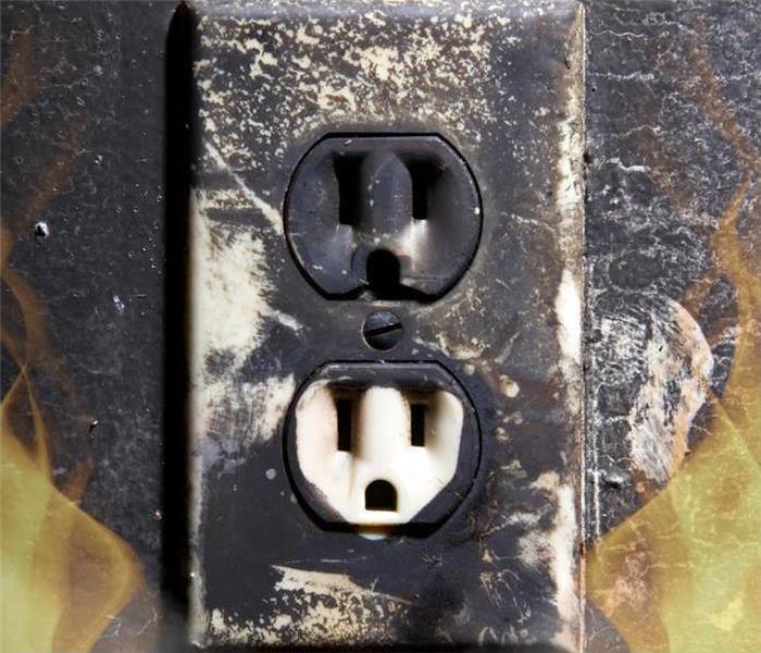 Outlet with soot